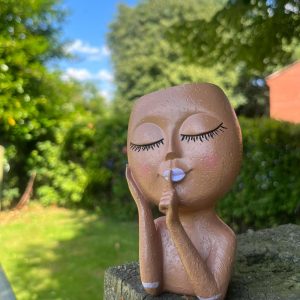 risen doll planter pot,